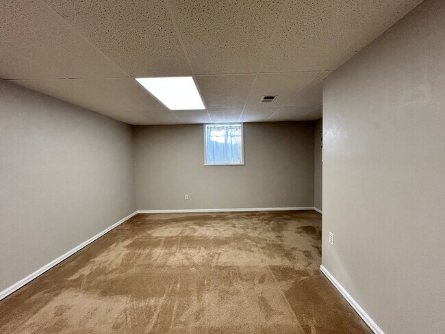 Building Photo - Spacious 3BR Duplex w/ Garage, Workshop, Large Backyard & Patio