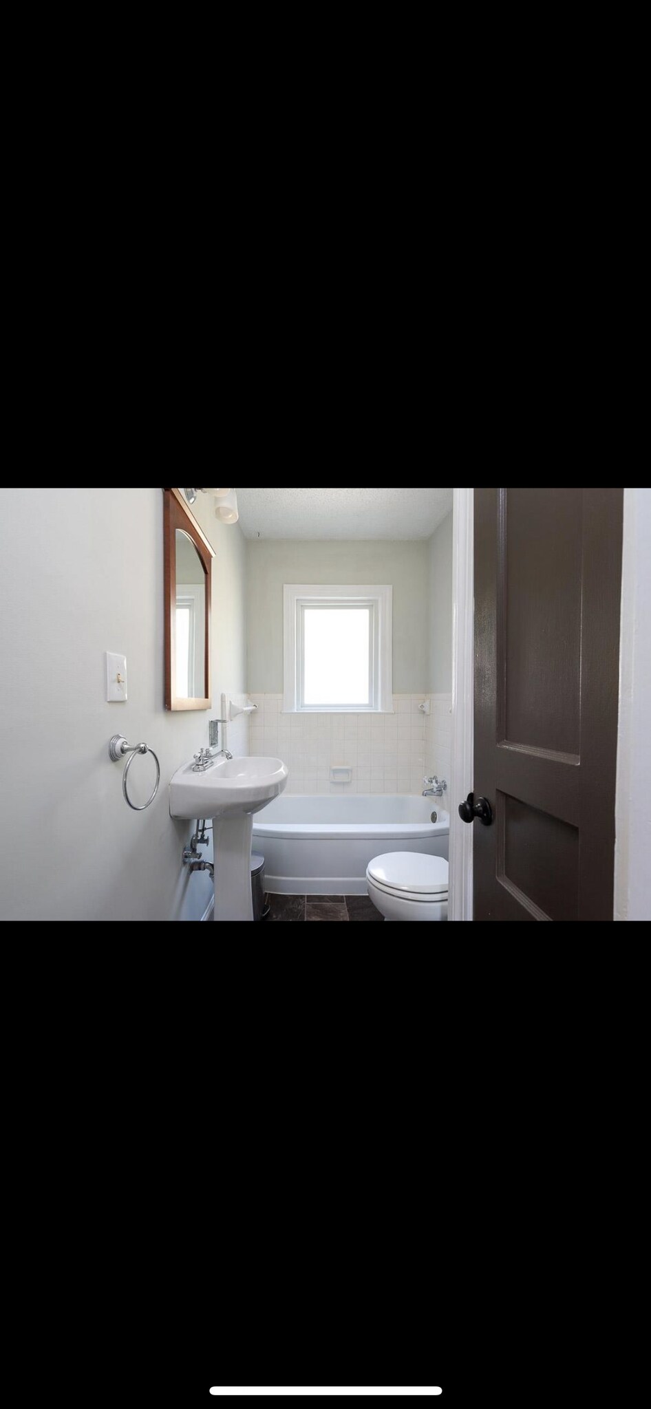 2nd bathroom has been updated with subway tile - 1131 Kenwood Dr