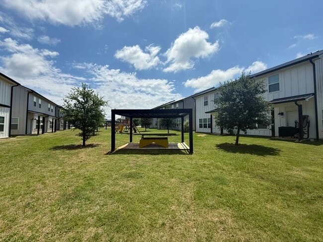 Building Photo - Sign a Lease By the End of July and Receive One Month of FREE Rent! Luxury 3 Bedroom 2.5 Bath Tow...