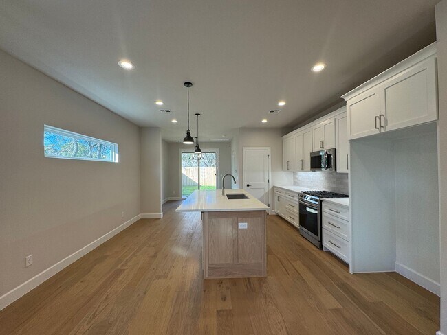 Building Photo - BRAND NEW - 4 bed - 3 bath - 2 car with fenced yard!