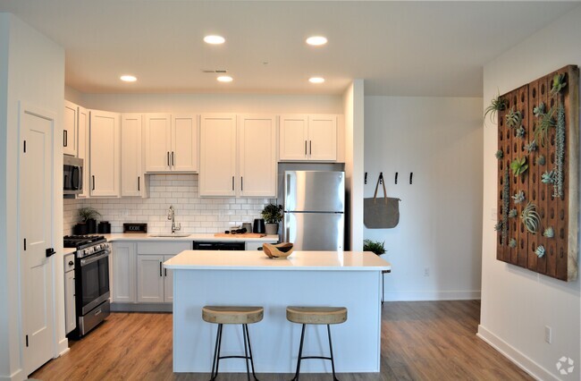 Open Kitchen Design with Island - The Reserve at Parsons Lake