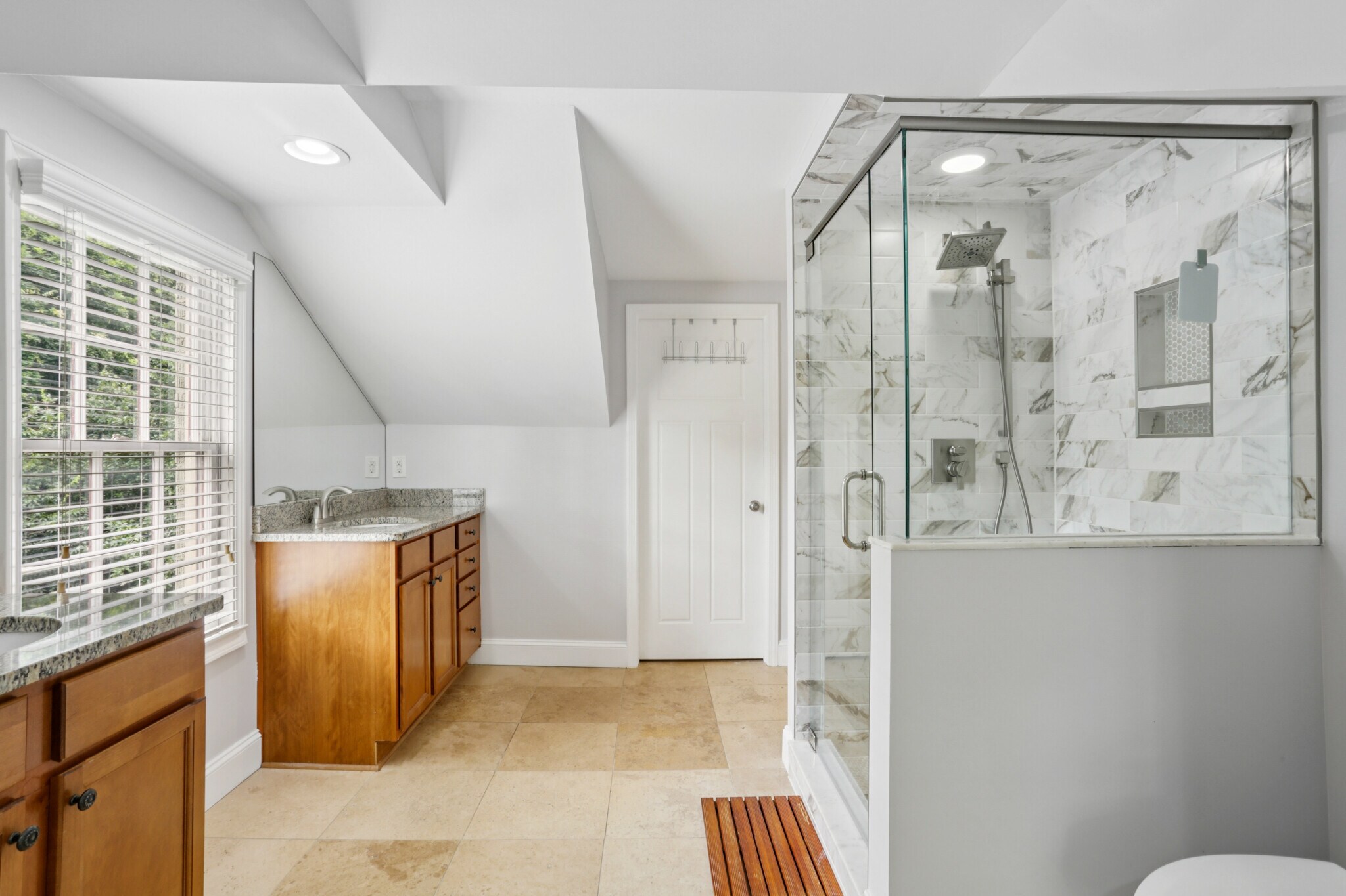 Large primary bathroom, newly renovated shower with double vanity and walk in closet - 781 Rosedale Ave SE