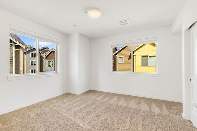 Building Photo - Modern Townhome in Upton at Crossroads Village – Stylish Living in a Prime Location