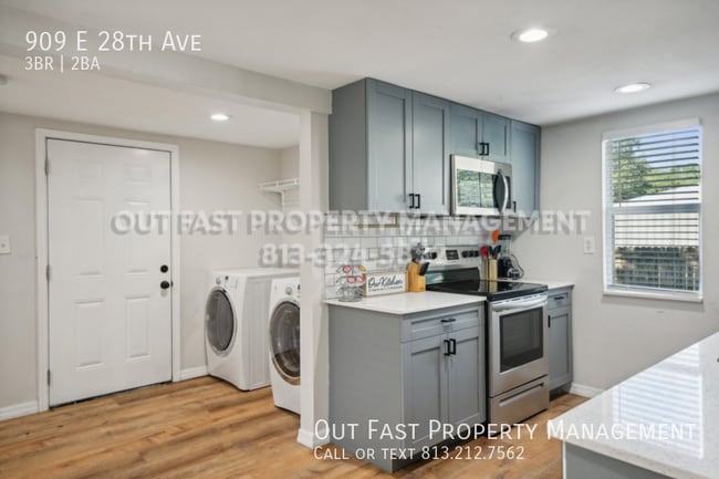 Building Photo - 909 E 28th Ave