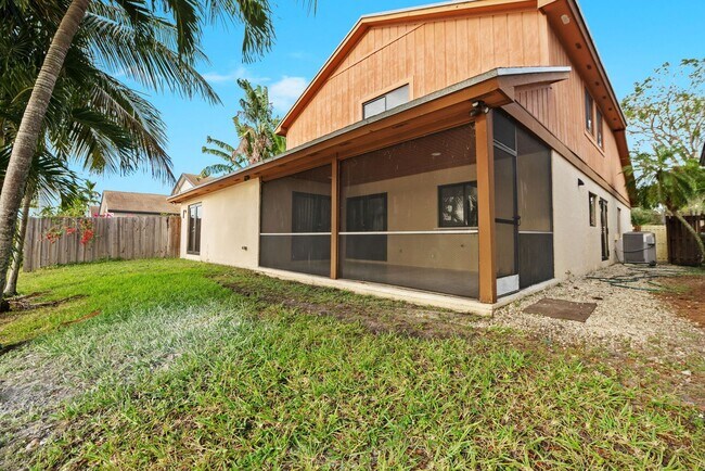 Building Photo - Stunning 4 Bed + Den | 3 Bath Waterfront Home – Miami, FL 33175