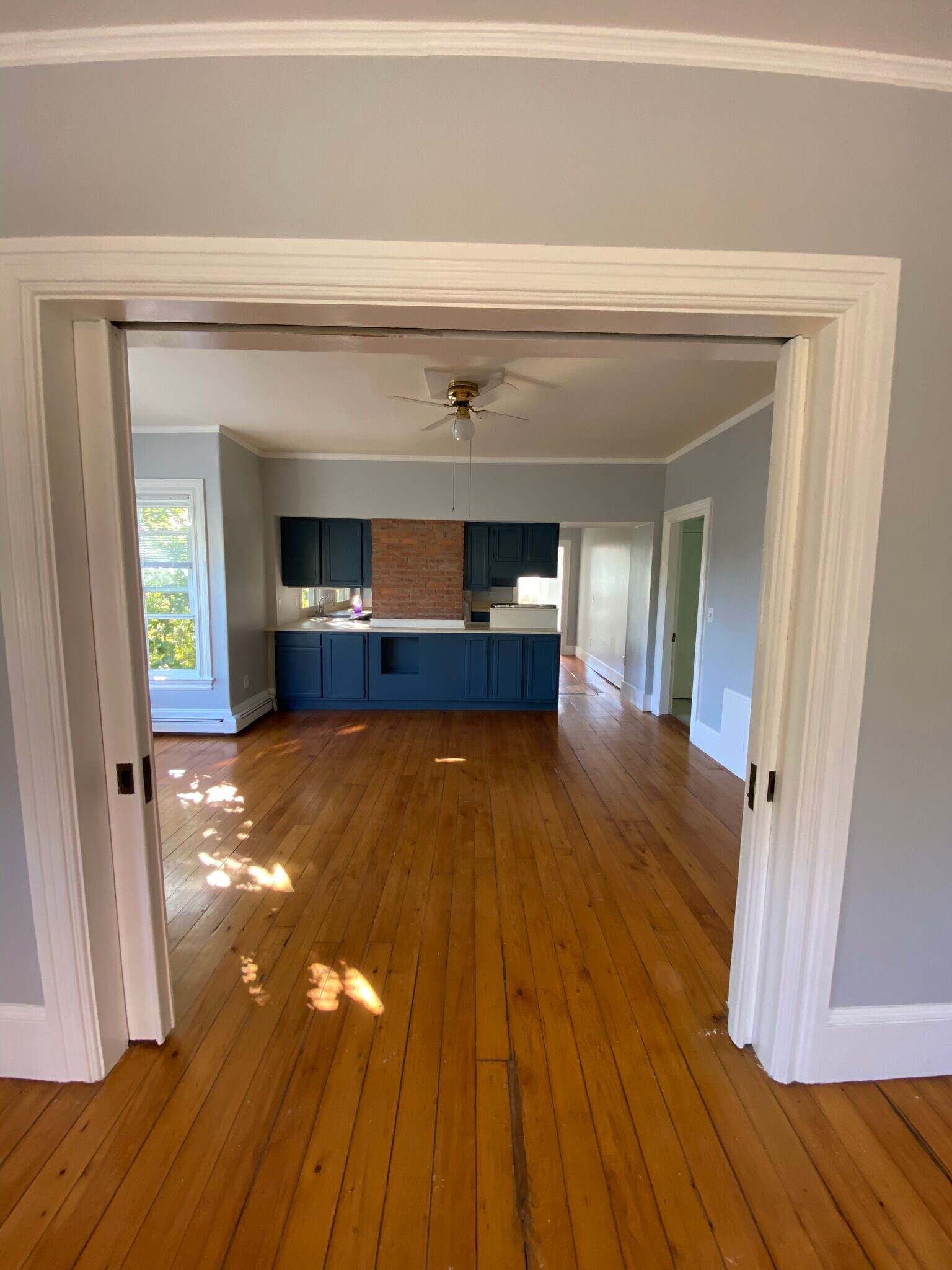 Dining room/second parlor with view of open concept kitchen - 86 Holden St