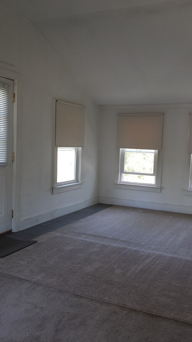 Closed in porch/storage space to back deck - 50 Douglass St