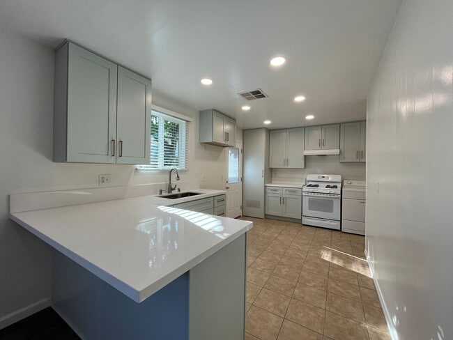 Building Photo - AVAILABLE NOW! Upgraded 3+1.5 w/backyard, ...