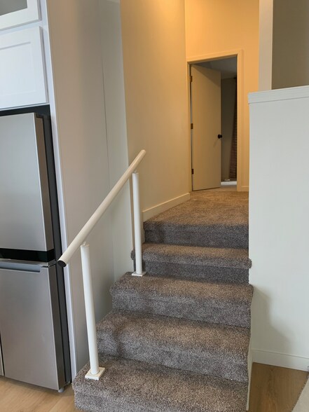 Stairs to 2 Bedrooms + Bathroom - 716 N. State St.