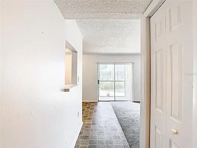 Building Photo - 2BR Condo Near UCF – All-Inclusive Living & Resort Amenities!