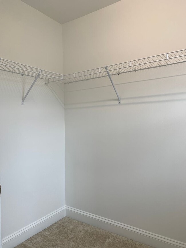 Building Photo - PRIME LOCATION, 3 Bedrooms Suites Apex TH Near HWY, Schools, Shops and Community Amenities!