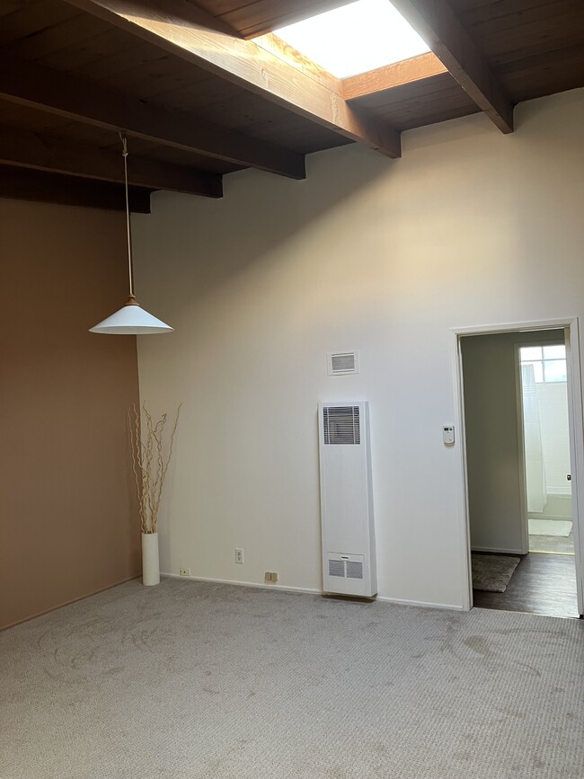 Liv/dining area with mocha accent wall - 11634 Gorham Ave