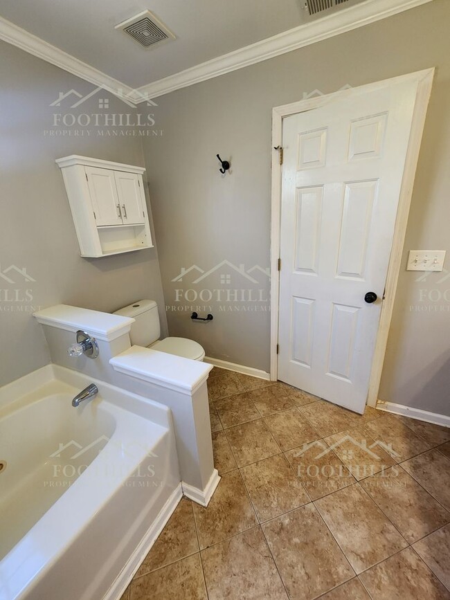 Building Photo - Beautiful 3-Bedroom Brick Home with Sunroo...