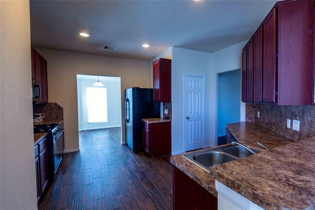 Building Photo - 15010 Rustler Gate Ln