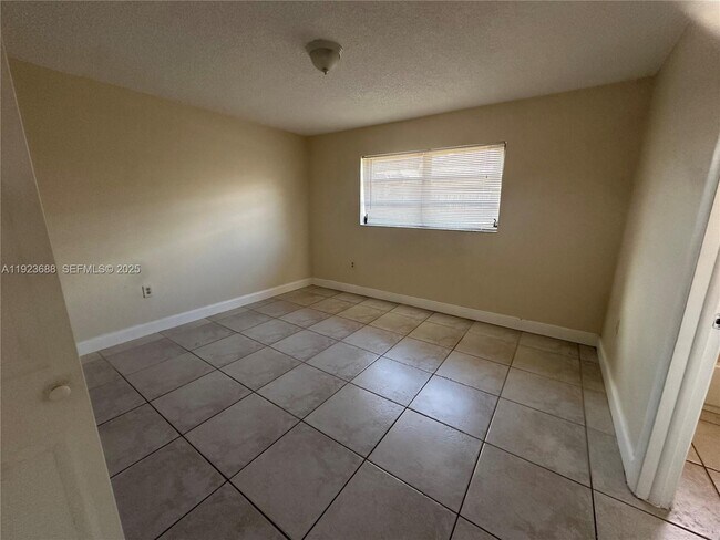 Building Photo - 4864 NW 4th Terrace