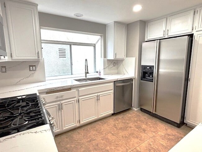 Building Photo - Stylish, Upgraded Laguna Niguel Home Ready...