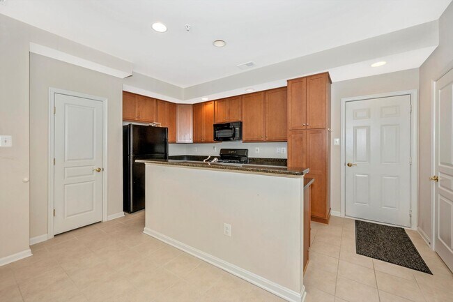 Building Photo - Desirable Two Level Condo For Lease - Not Pet Friendly