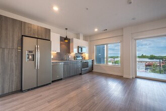 Building Photo - South Austin 2BR Condo with Balcony & Luxury Amenities