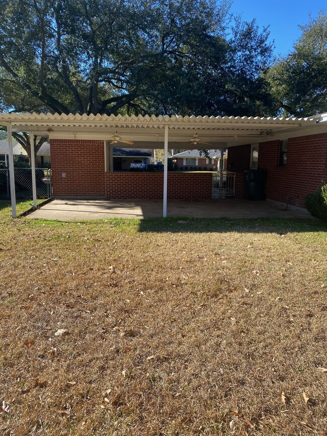 View of Covered Back Patio and Carport - 2312 Bienville Dr