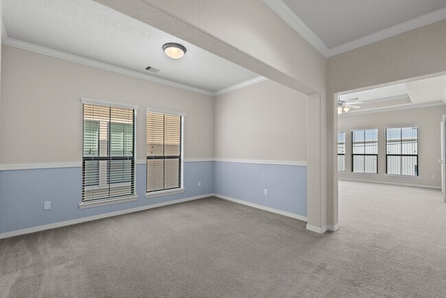 Building Photo - Luxury Townhome with Attached Garage & Outdoor Entertaining Area - $100 off first and second mont!