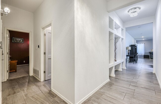 Building Photo - We have a beautiful home fully furnished with 3 bedroom-2 baths plus theater room (or a 4 bed room)