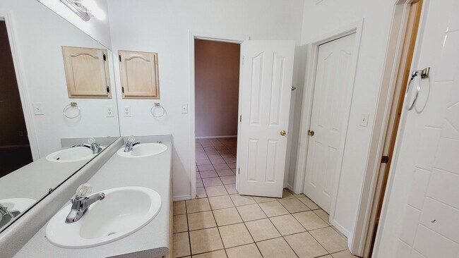 Building Photo - Recently painted 4 bedroom, 3 bath home in...