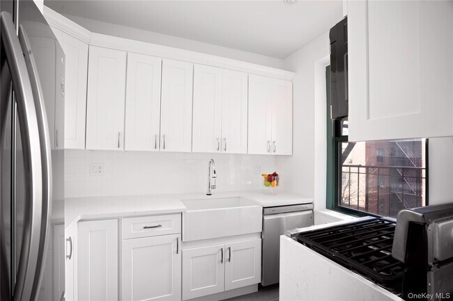 Building Photo - 34-40-40 79th St