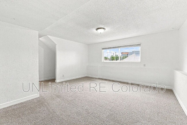 Building Photo - 3668 E 91st Ave