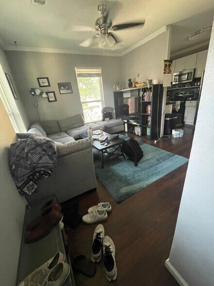 Living room with sofa center table tv - 204 E 30th St