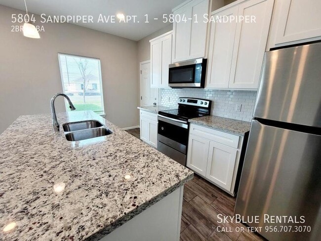 Building Photo - 5804 Sandpiper, 5804-1 Sandpiper