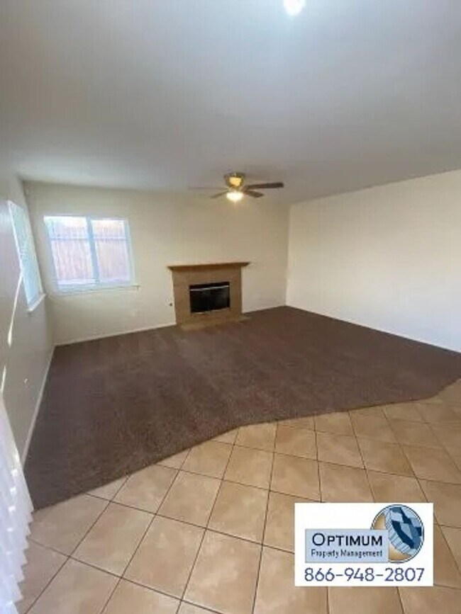 Building Photo - Spacious 4-Bedroom Home with 3-Car Garage & Downstairs Suite!