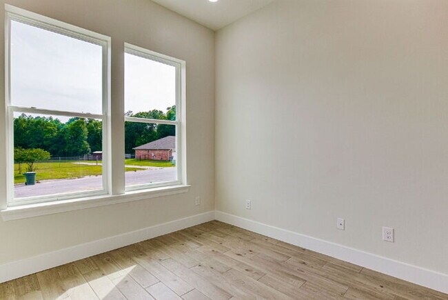 Building Photo - This luxurious new custom home in the sought-after Shadow Grove subdivision is a masterpiece of m...