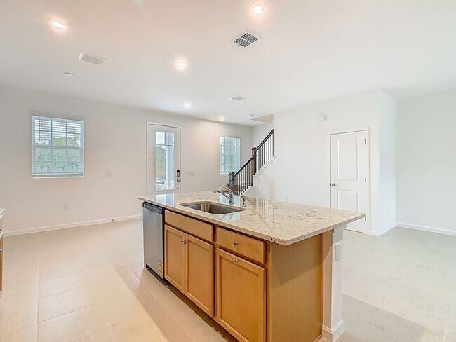 Building Photo - Brand New Luxury Town House in Island Village a Celebration, FL maintenance free community.