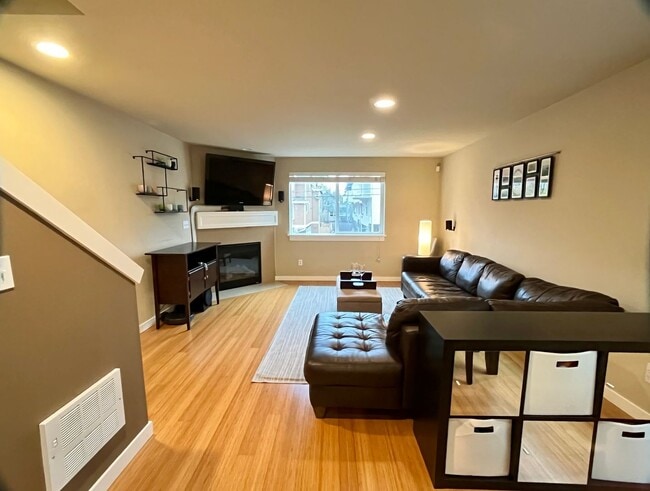 Building Photo - Stylish Greenwood Townhome with Private Patio & Modern Finishes