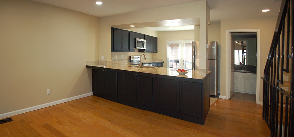 Extra storage under the kitchen bar - 8710 Park Ln