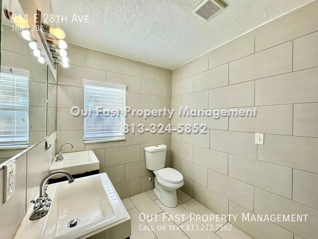 Building Photo - 911 E 28th Ave