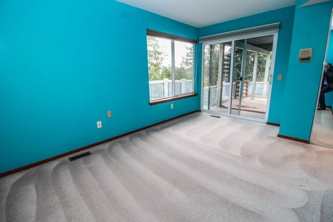 Building Photo - Spacious 4-Bedroom Home with Stunning Lake...