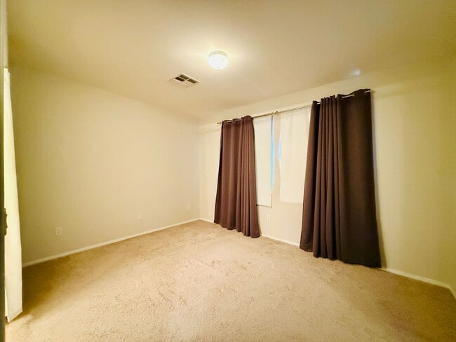 Building Photo - Immaculate and Inviting Two-Story Condo in Lone Mountain Available! 1/2 OFF THE FIRST FULL MONTH'...