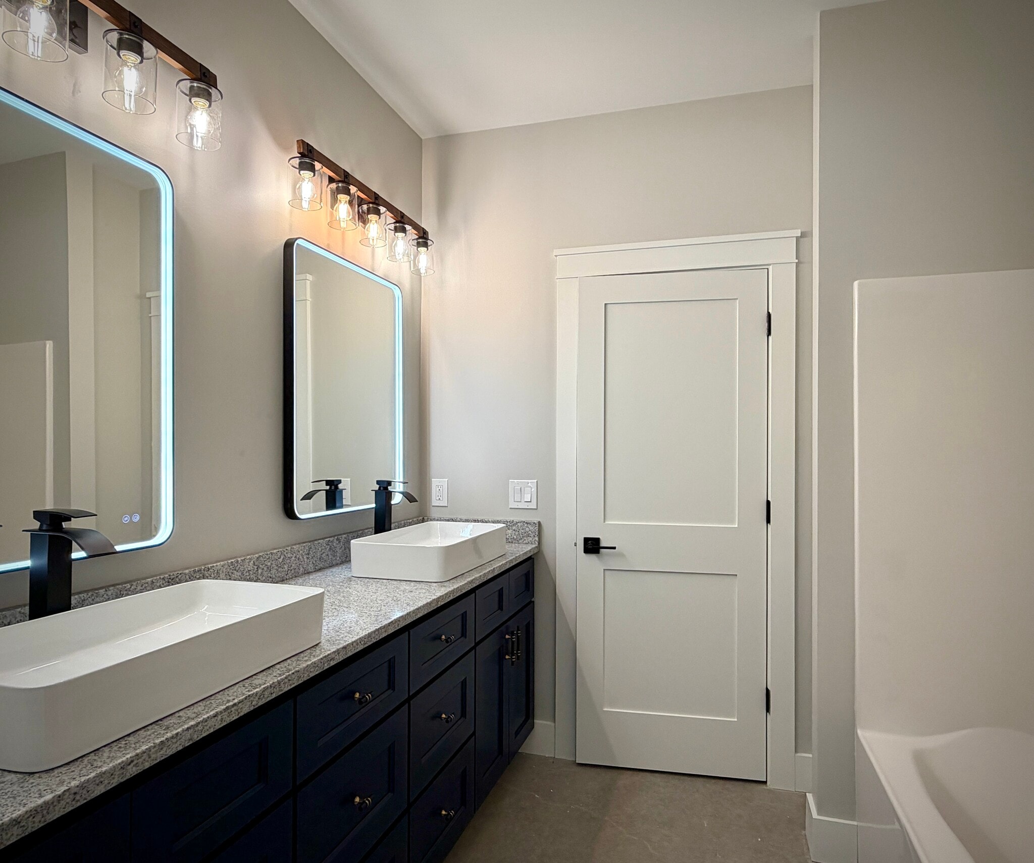 Communal bathroom with tub - 10671 US 31