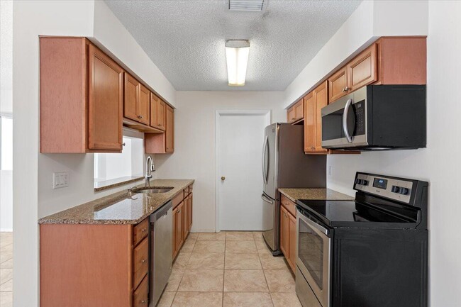 Building Photo - 3902 NW Cinnamon Tree Cir