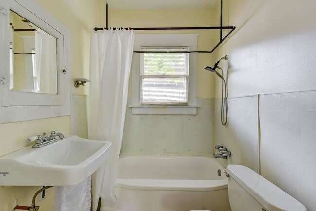 Building Photo - Old-world elegance with modern comfort!