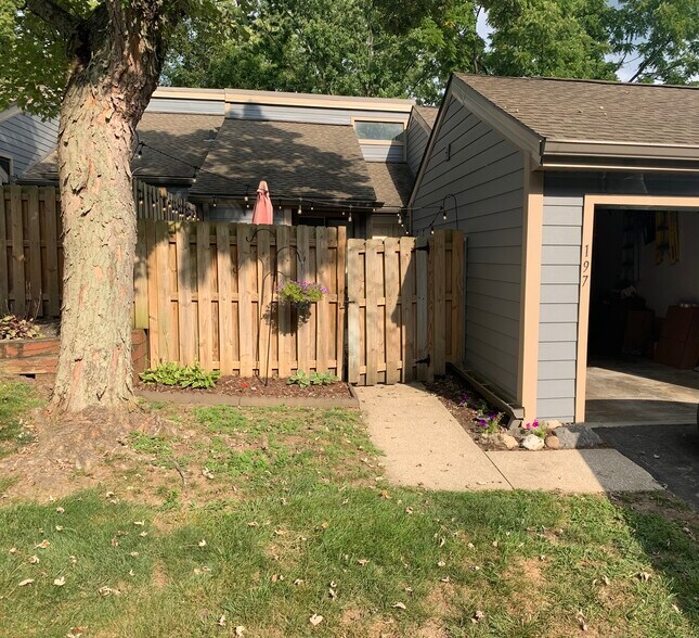 Gated front entrance attached to garage - 197 Sugarwood Ln