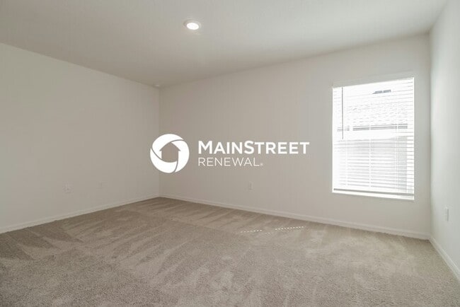 Building Photo - 4 Bedroom Pet-Friendly Home in Mascotte, FL with Main Street Renewal