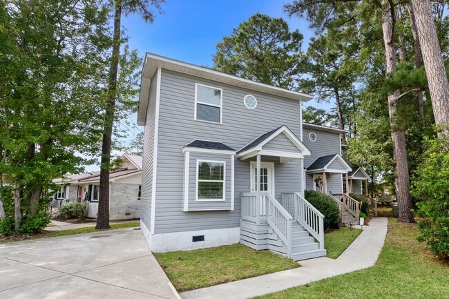 Primary Photo - End unit of a Triplex within walking dista...
