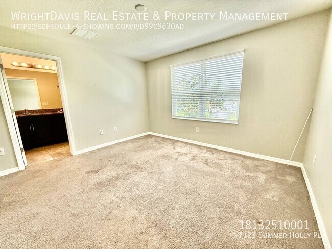Building Photo - 7123 Summer Holly Pl