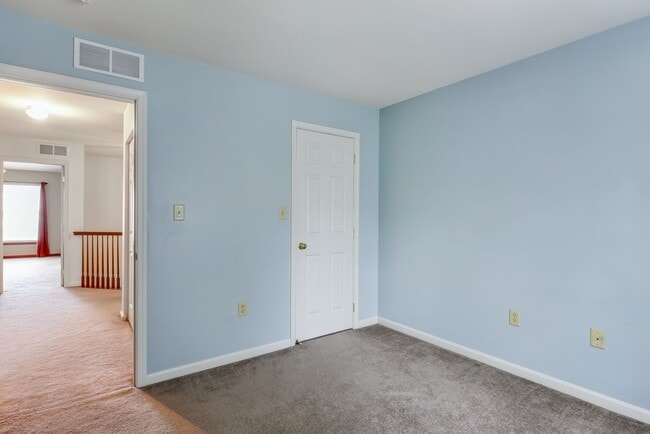 Building Photo - Three bedroom two and a half bathroom town...