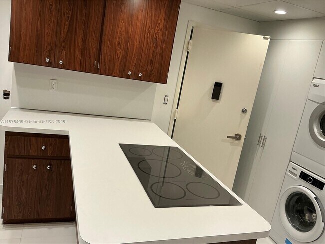 Building Photo - 10155 Collins Ave