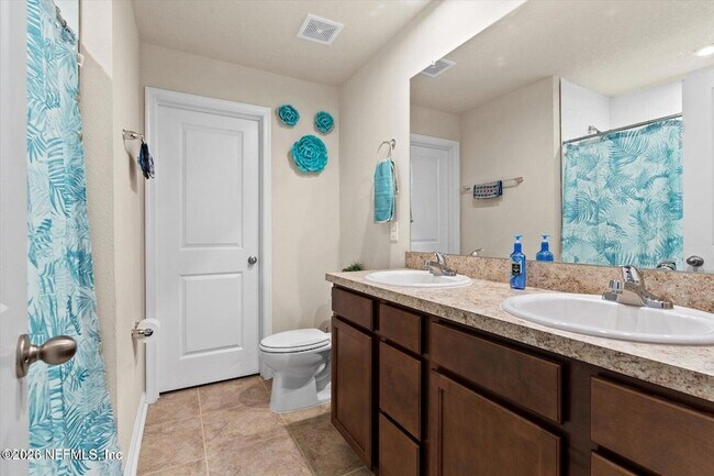 Building Photo - 5893 Creekside Crossing Dr