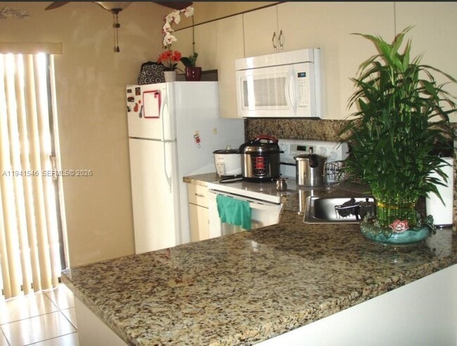 Building Photo - 5290 W 21st Ct