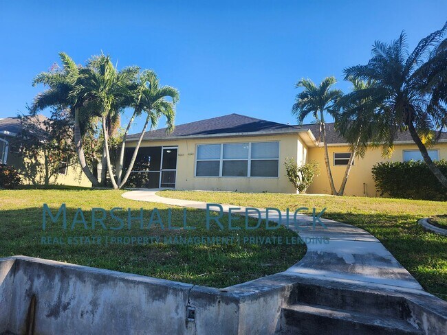 Building Photo - 3 BED 2 BATH SINGLE FAMILY HOME ON FRESH WATER CANAL WITH DOCK